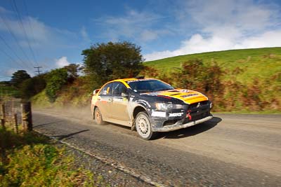 10;10;16-July-2011;APRC;Asia-Pacific-Rally-Championship;International-Rally-Of-Whangarei;Mitsubishi-Lancer-Evolution-X;NZ;New-Zealand;Northland;Rally;Sloan-Cox;Tarryn-Cox;Whangarei;auto;clouds;garage;landscape;motorsport;racing;scenery;sky;special-stage;wide-angle