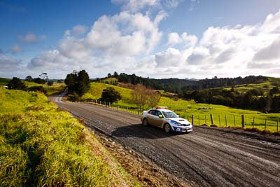 0;0;16-July-2011;APRC;Asia-Pacific-Rally-Championship;International-Rally-Of-Whangarei;NZ;New-Zealand;Northland;Rally;Safety-Car;Subaru-Impreza-WRX;Whangarei;auto;clouds;garage;motorsport;racing;sky;wide-angle