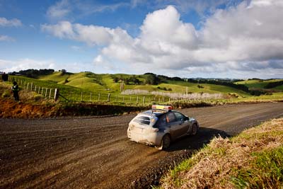 0;0;16-July-2011;APRC;Asia-Pacific-Rally-Championship;International-Rally-Of-Whangarei;NZ;New-Zealand;Northland;Rally;Safety-Car;Subaru-Impreza-WRX;Whangarei;auto;clouds;garage;motorsport;racing;sky;wide-angle