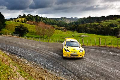 4;16-July-2011;4;APRC;Alister-McRae;Asia-Pacific-Rally-Championship;Bill-Hayes;International-Rally-Of-Whangarei;NZ;New-Zealand;Northland;Proton-Motorsports;Proton-Satria-Neo-S2000;Rally;Whangarei;auto;clouds;garage;landscape;motorsport;racing;scenery;sky;special-stage;wide-angle