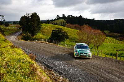 5;16-July-2011;2011-International-Rally-Of-Whangarei;5;APRC;Asia-Pacific-Rally-Championship;Brendan-Reeves;Brian-Green-Motorsport;International-Rally-Of-Whangarei;Mitsubishi-Lancer-Evolution-IX;NZ;New-Zealand;Northland;Rhianon-Smyth;Topshot;Whangarei;auto;clouds;garage;landscape;motorsport;racing;scenery;sky;special-stage;stage;trees;wide-angle