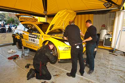 2;16-July-2011;2;APRC;Asia-Pacific-Rally-Championship;Chris-Atkinson;International-Rally-Of-Whangarei;NZ;New-Zealand;Northland;Proton-Motorsports;Proton-Satria-Neo-S2000;Rally;Stephane-Prevot;Whangarei;auto;garage;mechanics;motorsport;racing;service-park;wide-angle