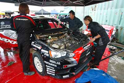 9;16-July-2011;9;APRC;Asia-Pacific-Rally-Championship;International-Rally-Of-Whangarei;NZ;New-Zealand;Northland;Pertamina-Cusco-Racing;Rally;Rifat-Sungkar;Scott-Beckwith;Whangarei;auto;garage;mechanics;motorsport;racing;service-park;wide-angle