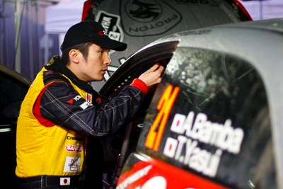 16-July-2011;50mm;APRC;Akira-Bamba;Asia-Pacific-Rally-Championship;International-Rally-Of-Whangarei;NZ;New-Zealand;Northland;Rally;Whangarei;auto;close‒up;detail;garage;motorsport;portrait;racing;service-park