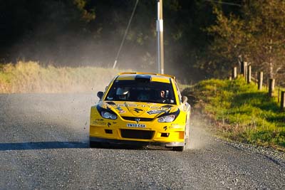 2;17-July-2011;2;APRC;Asia-Pacific-Rally-Championship;Chris-Atkinson;International-Rally-Of-Whangarei;NZ;New-Zealand;Northland;Proton-Motorsports;Proton-Satria-Neo-S2000;Rally;Stephane-Prevot;Whangarei;auto;garage;motorsport;racing;special-stage;super-telephoto