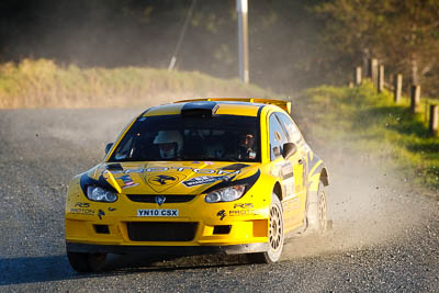 2;17-July-2011;2;APRC;Asia-Pacific-Rally-Championship;Chris-Atkinson;International-Rally-Of-Whangarei;NZ;New-Zealand;Northland;Proton;Proton-Motorsports;Proton-Satria-Neo-S2000;Rally;Stephane-Prevot;Whangarei;auto;garage;motorsport;racing;special-stage;super-telephoto