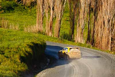 2;17-July-2011;2;APRC;Asia-Pacific-Rally-Championship;Chris-Atkinson;International-Rally-Of-Whangarei;NZ;New-Zealand;Northland;Proton;Proton-Motorsports;Proton-Satria-Neo-S2000;Rally;Stephane-Prevot;Whangarei;auto;garage;motorsport;racing;special-stage;super-telephoto