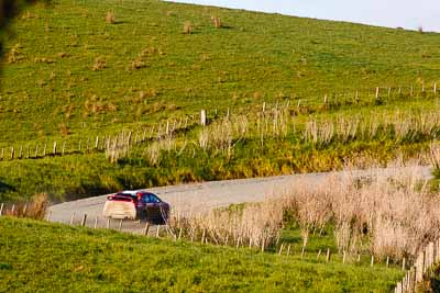 1;1;17-July-2011;APRC;Asia-Pacific-Rally-Championship;International-Rally-Of-Whangarei;Katsu-Taguchi;Mark-Stacey;Mitsubishi-Lancer-Evolution-X;NZ;New-Zealand;Northland;Rally;Team-MRF;Topshot;Whangarei;auto;garage;motorsport;racing;special-stage;super-telephoto