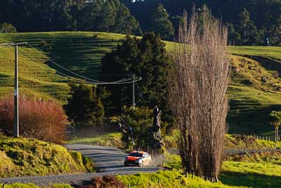 10;10;17-July-2011;APRC;Asia-Pacific-Rally-Championship;International-Rally-Of-Whangarei;Mitsubishi-Lancer-Evolution-X;NZ;New-Zealand;Northland;Rally;Sloan-Cox;Tarryn-Cox;Whangarei;auto;garage;motorsport;racing;special-stage;super-telephoto