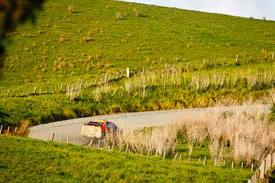 10;10;17-July-2011;APRC;Asia-Pacific-Rally-Championship;International-Rally-Of-Whangarei;Mitsubishi-Lancer-Evolution-X;NZ;New-Zealand;Northland;Rally;Sloan-Cox;Tarryn-Cox;Whangarei;auto;garage;motorsport;racing;special-stage;super-telephoto