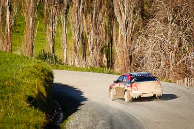 19;17-July-2011;19;APRC;Asia-Pacific-Rally-Championship;Fan-Fan;International-Rally-Of-Whangarei;Junwei-Fang;Mitsubishi-Lancer-Evolution-X;NZ;New-Zealand;Northland;Rally;Soueast-Motor-Kumho-Team;Topshot;Whangarei;auto;garage;motorsport;racing;special-stage;super-telephoto