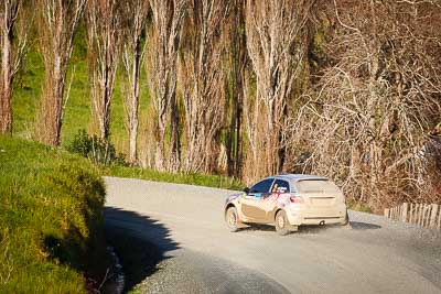 21;17-July-2011;21;APRC;Akira-Bamba;Asia-Pacific-Rally-Championship;International-Rally-Of-Whangarei;NZ;New-Zealand;Northland;Proton-Cusco-Rally-Team;Proton-Satria-Neo;Rally;Takahiro-Yasui;Whangarei;auto;garage;motorsport;racing;special-stage;super-telephoto