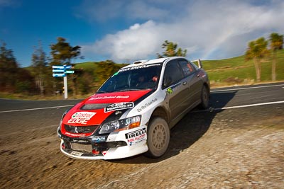 25;17-July-2011;25;APRC;Asia-Pacific-Rally-Championship;Chris-West;Erin-Kyle;International-Rally-Of-Whangarei;Mitsubishi-Lancer-Evolution-IX;NZ;New-Zealand;Northland;Rally;Whangarei;auto;clouds;garage;motorsport;racing;sky;special-stage;wide-angle