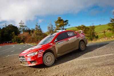 1;1;17-July-2011;APRC;Asia-Pacific-Rally-Championship;International-Rally-Of-Whangarei;Katsu-Taguchi;Mark-Stacey;Mitsubishi-Lancer-Evolution-X;NZ;New-Zealand;Northland;Rally;Team-MRF;Whangarei;auto;clouds;garage;motorsport;racing;sky;special-stage;wide-angle