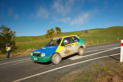 84;17-July-2011;APRC;Asia-Pacific-Rally-Championship;Daniel-Willson;International-Rally-Of-Whangarei;Michael-Young;NZ;New-Zealand;Nissan-March;Northland;Rally;Whangarei;auto;clouds;garage;motorsport;racing;sky;special-stage;wide-angle