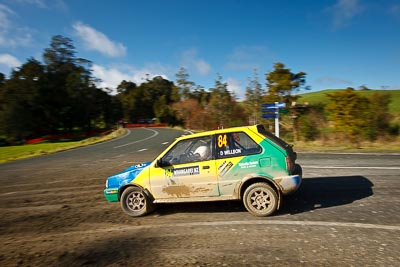 84;17-July-2011;APRC;Asia-Pacific-Rally-Championship;Daniel-Willson;International-Rally-Of-Whangarei;Michael-Young;NZ;New-Zealand;Nissan-March;Northland;Rally;Whangarei;auto;clouds;garage;motorsport;racing;sky;special-stage;wide-angle