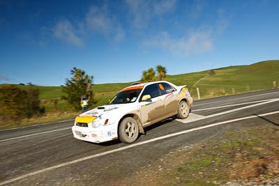 48;17-July-2011;48;APRC;Aaron-Conaghan;Asia-Pacific-Rally-Championship;Carl-Adnitt;International-Rally-Of-Whangarei;NZ;New-Zealand;Northland;Rally;Subaru-Impreza-RS;Whangarei;auto;clouds;garage;motorsport;racing;sky;special-stage;wide-angle