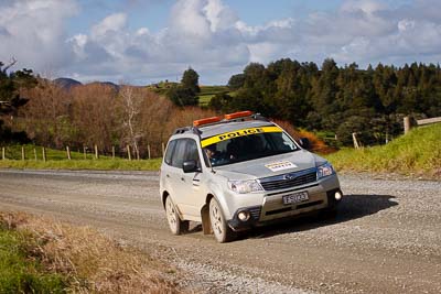17-July-2011;APRC;Asia-Pacific-Rally-Championship;International-Rally-Of-Whangarei;NZ;New-Zealand;Northland;Police;Rally;Subaru-Forester;Whangarei;auto;clouds;garage;motorsport;racing;sky;telephoto