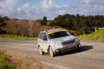 17-July-2011;APRC;Asia-Pacific-Rally-Championship;International-Rally-Of-Whangarei;NZ;New-Zealand;Northland;Police;Rally;Subaru-Forester;Whangarei;auto;clouds;garage;motorsport;racing;sky;telephoto