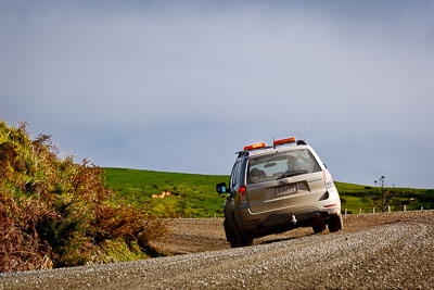 17-July-2011;APRC;Asia-Pacific-Rally-Championship;International-Rally-Of-Whangarei;NZ;New-Zealand;Northland;Police;Rally;Subaru-Forester;Whangarei;auto;clouds;garage;motorsport;racing;sky;telephoto