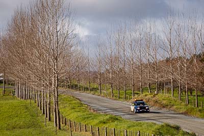 0;0;17-July-2011;APRC;Asia-Pacific-Rally-Championship;International-Rally-Of-Whangarei;NZ;New-Zealand;Northland;Rally;Safety-Car;Subaru-Impreza-WRX;Whangarei;auto;clouds;garage;motorsport;racing;sky;telephoto