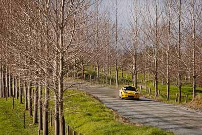 2;17-July-2011;2;APRC;Asia-Pacific-Rally-Championship;Chris-Atkinson;International-Rally-Of-Whangarei;NZ;New-Zealand;Northland;Proton-Motorsports;Proton-Satria-Neo-S2000;Rally;Stephane-Prevot;Whangarei;auto;garage;landscape;motorsport;racing;scenery;special-stage;telephoto