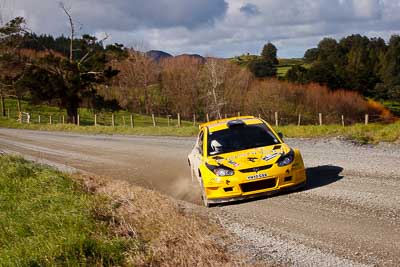 2;17-July-2011;2;APRC;Asia-Pacific-Rally-Championship;Chris-Atkinson;International-Rally-Of-Whangarei;NZ;New-Zealand;Northland;Proton-Motorsports;Proton-Satria-Neo-S2000;Rally;Stephane-Prevot;Topshot;Whangarei;auto;garage;landscape;motorsport;racing;scenery;special-stage;telephoto