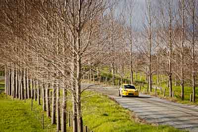 4;17-July-2011;4;APRC;Alister-McRae;Asia-Pacific-Rally-Championship;Bill-Hayes;International-Rally-Of-Whangarei;NZ;New-Zealand;Northland;Proton-Motorsports;Proton-Satria-Neo-S2000;Rally;Whangarei;auto;garage;landscape;motorsport;racing;scenery;special-stage;telephoto