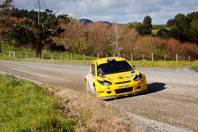 4;17-July-2011;4;APRC;Alister-McRae;Asia-Pacific-Rally-Championship;Bill-Hayes;International-Rally-Of-Whangarei;NZ;New-Zealand;Northland;Proton-Motorsports;Proton-Satria-Neo-S2000;Rally;Whangarei;auto;garage;landscape;motorsport;racing;scenery;special-stage;telephoto
