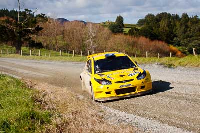 4;17-July-2011;4;APRC;Alister-McRae;Asia-Pacific-Rally-Championship;Bill-Hayes;NZ;New-Zealand;Northland;Proton;Proton-Motorsports;Proton-Satria-Neo-S2000;Rally;auto;garage;landscape;motorsport;racing;scenery;special-stage;telephoto