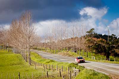 6;17-July-2011;2011-International-Rally-Of-Whangarei;6;APRC;Asia-Pacific-Rally-Championship;International-Rally-Of-Whangarei;Mitsubishi-Lancer-Evolution-X;NZ;New-Zealand;Northland;Richard-Mason;Sara-Mason;Soueast-Motor-Kumho-Team;Topshot;Whangarei;auto;clouds;garage;landscape;motorsport;racing;scenery;sky;special-stage;stage;telephoto;trees