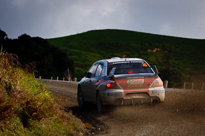 25;17-July-2011;25;APRC;Asia-Pacific-Rally-Championship;Chris-West;Erin-Kyle;International-Rally-Of-Whangarei;Mitsubishi-Lancer-Evolution-IX;NZ;New-Zealand;Northland;Rally;Whangarei;auto;garage;landscape;motorsport;racing;scenery;special-stage;telephoto