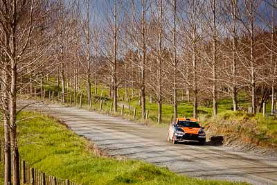 10;10;17-July-2011;APRC;Asia-Pacific-Rally-Championship;International-Rally-Of-Whangarei;Mitsubishi-Lancer-Evolution-X;NZ;New-Zealand;Northland;Rally;Sloan-Cox;Tarryn-Cox;Whangarei;auto;garage;landscape;motorsport;racing;scenery;special-stage;telephoto