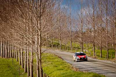 9;17-July-2011;9;APRC;Asia-Pacific-Rally-Championship;International-Rally-Of-Whangarei;NZ;New-Zealand;Northland;Pertamina-Cusco-Racing;Rally;Rifat-Sungkar;Scott-Beckwith;Whangarei;auto;garage;landscape;motorsport;racing;scenery;special-stage;telephoto