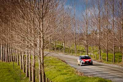 9;17-July-2011;9;APRC;Asia-Pacific-Rally-Championship;International-Rally-Of-Whangarei;NZ;New-Zealand;Northland;Pertamina-Cusco-Racing;Rally;Rifat-Sungkar;Scott-Beckwith;Whangarei;auto;garage;landscape;motorsport;racing;scenery;special-stage;telephoto