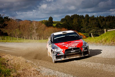9;17-July-2011;9;APRC;Asia-Pacific-Rally-Championship;International-Rally-Of-Whangarei;NZ;New-Zealand;Northland;Pertamina-Cusco-Racing;Rally;Rifat-Sungkar;Scott-Beckwith;Whangarei;auto;garage;landscape;motorsport;racing;scenery;special-stage;telephoto