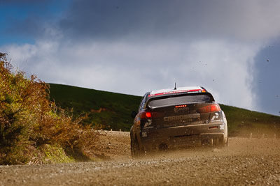 9;17-July-2011;9;APRC;Asia-Pacific-Rally-Championship;International-Rally-Of-Whangarei;NZ;New-Zealand;Northland;Pertamina-Cusco-Racing;Rally;Rifat-Sungkar;Scott-Beckwith;Whangarei;auto;garage;landscape;motorsport;racing;scenery;special-stage;telephoto