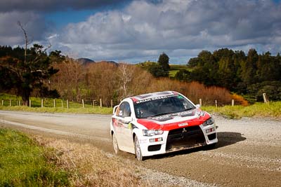 16;16;17-July-2011;APRC;Asia-Pacific-Rally-Championship;Brian-Green;Brian-Green-Motorsport;Fleur-Pedersen;International-Rally-Of-Whangarei;Mitsubishi-Lancer-Evolution-X;NZ;New-Zealand;Northland;Rally;Whangarei;auto;garage;landscape;motorsport;racing;scenery;special-stage;telephoto