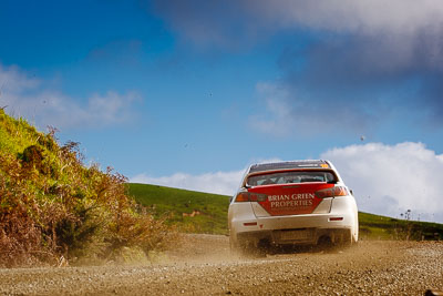 16;16;17-July-2011;APRC;Asia-Pacific-Rally-Championship;Brian-Green;Brian-Green-Motorsport;Fleur-Pedersen;International-Rally-Of-Whangarei;Mitsubishi-Lancer-Evolution-X;NZ;New-Zealand;Northland;Rally;Whangarei;auto;garage;landscape;motorsport;racing;scenery;special-stage;telephoto