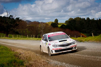 17;17;17-July-2011;APRC;Asia-Pacific-Rally-Championship;Daniel-Palau;International-Rally-Of-Whangarei;NZ;New-Zealand;Northland;Possum-Bourne-Motorsport;Rally;Subaru-Impreza-WRX-STI;Thierry-Song;Whangarei;auto;garage;landscape;motorsport;racing;scenery;special-stage;telephoto