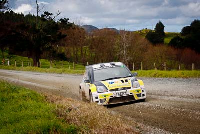 30;17-July-2011;30;APRC;Asia-Pacific-Rally-Championship;Bruce-McKenzie;Dave-Strong;Ford-Fiesta-S2000;International-Rally-Of-Whangarei;NZ;New-Zealand;Northland;Rally;Whangarei;auto;garage;landscape;motorsport;racing;scenery;special-stage;telephoto