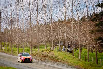 19;17-July-2011;19;APRC;Asia-Pacific-Rally-Championship;Fan-Fan;International-Rally-Of-Whangarei;Junwei-Fang;Mitsubishi-Lancer-Evolution-X;NZ;New-Zealand;Northland;Rally;Soueast-Motor-Kumho-Team;Whangarei;auto;garage;landscape;motorsport;racing;scenery;special-stage;telephoto