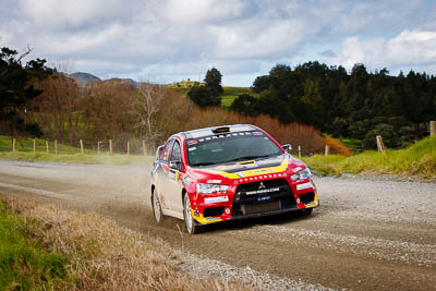 19;17-July-2011;19;APRC;Asia-Pacific-Rally-Championship;Fan-Fan;International-Rally-Of-Whangarei;Junwei-Fang;Mitsubishi-Lancer-Evolution-X;NZ;New-Zealand;Northland;Rally;Soueast-Motor-Kumho-Team;Whangarei;auto;garage;landscape;motorsport;racing;scenery;special-stage;telephoto