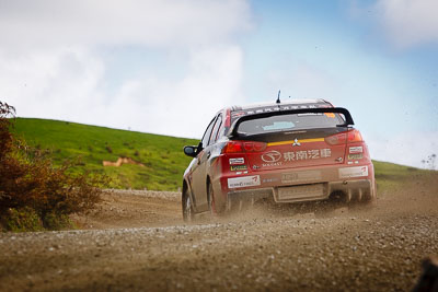 19;17-July-2011;19;APRC;Asia-Pacific-Rally-Championship;Fan-Fan;International-Rally-Of-Whangarei;Junwei-Fang;Mitsubishi-Lancer-Evolution-X;NZ;New-Zealand;Northland;Rally;Soueast-Motor-Kumho-Team;Whangarei;auto;garage;landscape;motorsport;racing;scenery;special-stage;telephoto