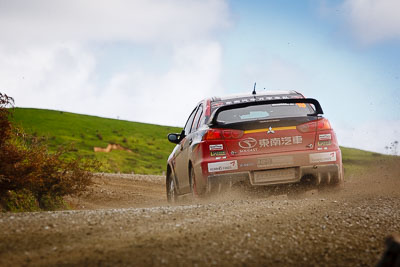 19;17-July-2011;19;APRC;Asia-Pacific-Rally-Championship;Fan-Fan;International-Rally-Of-Whangarei;Junwei-Fang;Mitsubishi-Lancer-Evolution-X;NZ;New-Zealand;Northland;Rally;Soueast-Motor-Kumho-Team;Whangarei;auto;garage;landscape;motorsport;racing;scenery;special-stage;telephoto