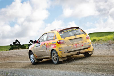 -31;17-July-2011;31;APRC;Asia-Pacific-Rally-Championship;International-Rally-Of-Whangarei;Musa-Sherif;NZ;New-Zealand;Northland;Pennzoil-GSR-Racing-Team;Rally;Sanjay-Ram-Takle;Whangarei;auto;garage;landscape;motorsport;racing;scenery;special-stage;telephoto