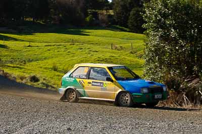 84;17-July-2011;APRC;Asia-Pacific-Rally-Championship;Daniel-Willson;International-Rally-Of-Whangarei;Michael-Young;NZ;New-Zealand;Nissan-March;Northland;Rally;Whangarei;auto;garage;motorsport;racing;special-stage;telephoto