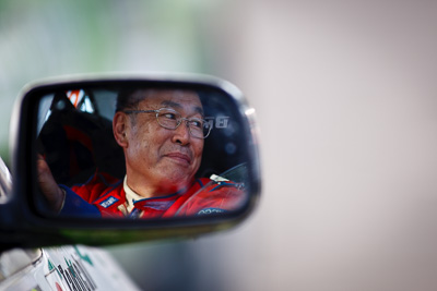 17-July-2011;APRC;Asia-Pacific-Rally-Championship;International-Rally-Of-Whangarei;NZ;New-Zealand;Northland;Rally;Seiichiro-Taguchi;Whangarei;auto;garage;in‒car;mirror;motorsport;portrait;racing;reflection;service-park;super-telephoto