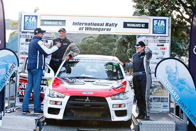 16;16;17-July-2011;APRC;Asia-Pacific-Rally-Championship;Brian-Green;Brian-Green-Motorsport;Fleur-Pedersen;International-Rally-Of-Whangarei;Mitsubishi-Lancer-Evolution-X;NZ;New-Zealand;Northland;Rally;Whangarei;auto;garage;motorsport;podium;racing;telephoto