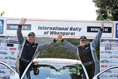 16;16;17-July-2011;APRC;Asia-Pacific-Rally-Championship;Brian-Green;Brian-Green-Motorsport;Fleur-Pedersen;International-Rally-Of-Whangarei;Mitsubishi-Lancer-Evolution-X;NZ;New-Zealand;Northland;Rally;Whangarei;auto;garage;motorsport;podium;racing;telephoto